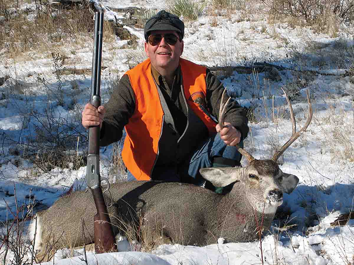 Mike’s friend Kirk Stovall with a Montana mule deer he shot with a Winchester Model 1886 .40-65.